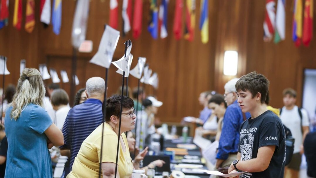 Students look into their international options Sept. 17 during a Study Abroad Fair at the University of Iowa’s Iowa Memorial Union in Iowa City. Exhibitors from various colleges at the university as well as organizations had information of their study abroad programs and international internships for students to explore. (Jim Slosiarek/The Gazette)